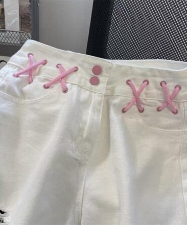 Ashrykins pixie denim shorts with raw hem edge in white